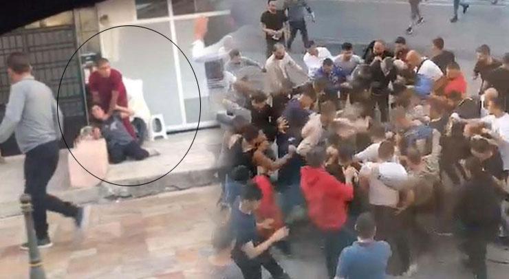 Cadde ortasında eşinin boğazını kesti! Linç girişimi