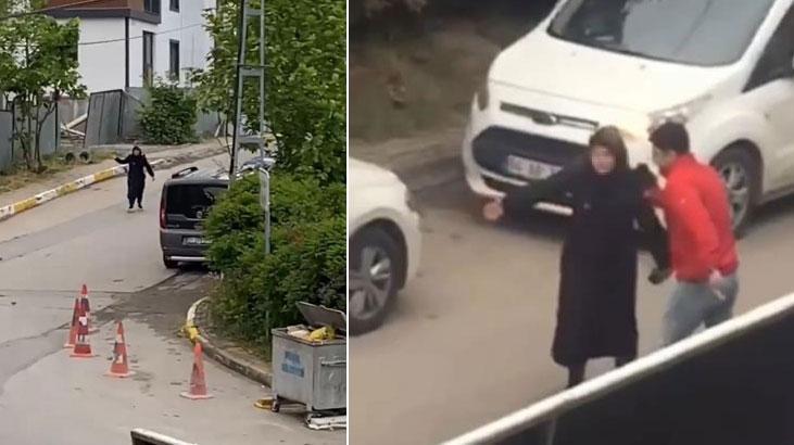 Ailesine sinirlenen kadın mahalledeki araçlara zarar verdi